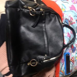 Medium size black leather backpack purse